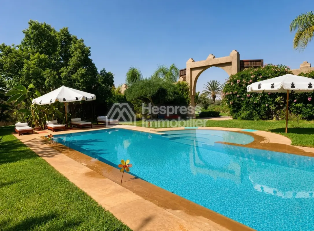 Kasbah with private lake and Andalusian gardens