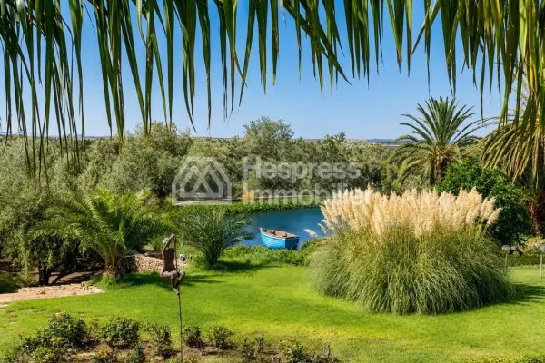 Kasbah with private lake and Andalusian gardens