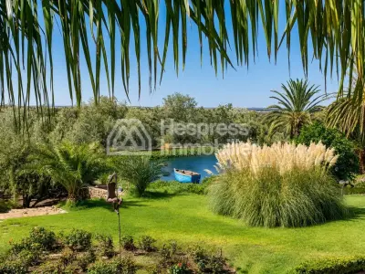 Kasbah with private lake and Andalusian gardens