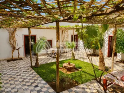 Kasbah with private lake and Andalusian gardens