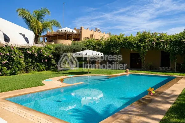 Kasbah with private lake and Andalusian gardens