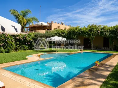 Kasbah with private lake and Andalusian gardens