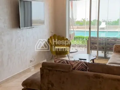 شقة للبيع في سيدي رحال . مساحتها 73 مترًا مربعًا. شرفة جميلة بإطلالة على الحديقة.