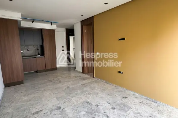 For sale: a beautiful apartment in Palmier . Total area 49 m². Features a traditional Moroccan living room and is located in a secure residence.