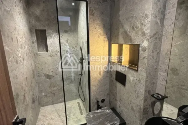 For sale: a beautiful apartment in Palmier . Total area 49 m². Features a traditional Moroccan living room and is located in a secure residence.