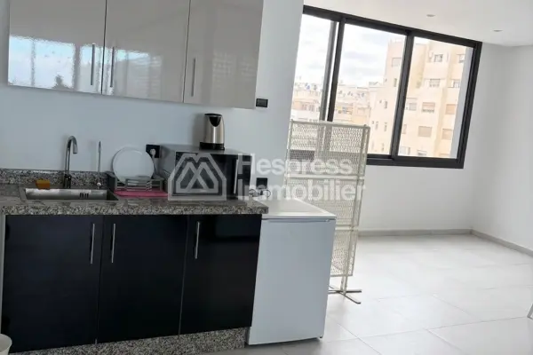 Offices for rent at Aïn Diab . 87 sq m. Building with concierge and air conditioning.