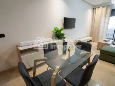 Appartement à louer à Oulfa. Surface de 60 m². Garage et terrasse
