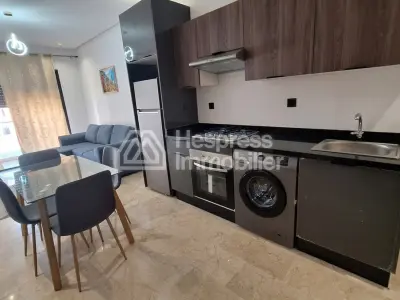 Appartement à louer à Oulfa. Surface de 60 m². Garage et terrasse