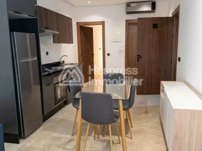 Appartement à louer à Oulfa. Surface de 60 m². Garage et terrasse