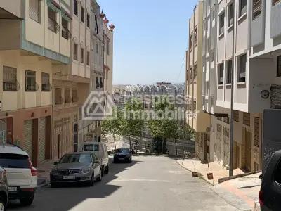 Maison en cours de finition au quartier Charf