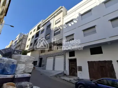 Maison en cours de finition au quartier Charf