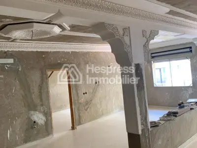 Maison en cours de finition au quartier Charf