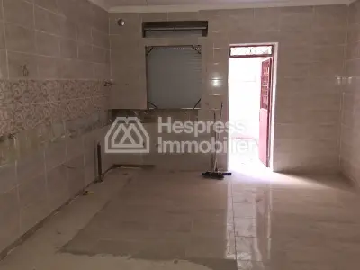 Maison en cours de finition au quartier Charf