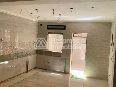 Maison en cours de finition au quartier Charf