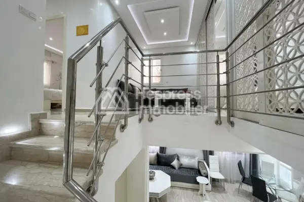 Elegant Duplex with Private Garden in a Secure Residence