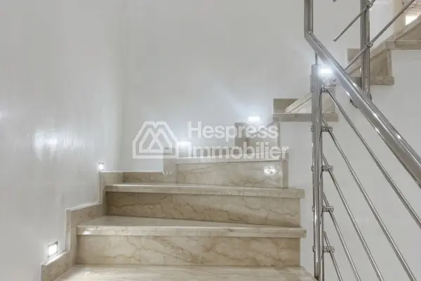 Elegant Duplex with Private Garden in a Secure Residence