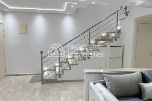 Elegant Duplex with Private Garden in a Secure Residence