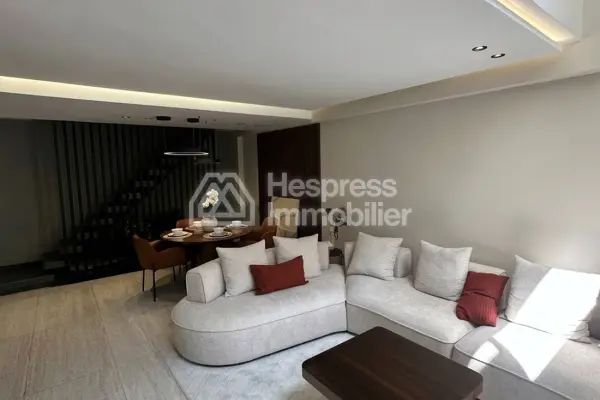 Duplex with a great terrace, jacuzzi, fitness room, and padel tennis court.