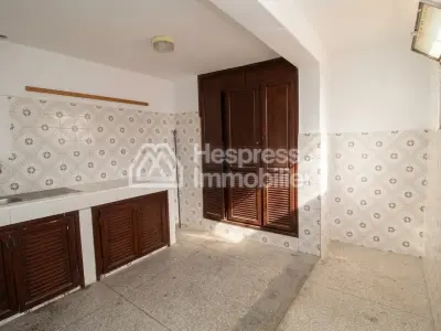Two-story house with independent apartment and duplex