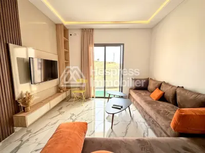 Appartement en bord de mer à Aourir avec piscine