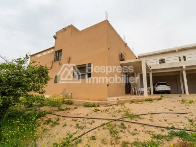 Property with house and wooded grounds