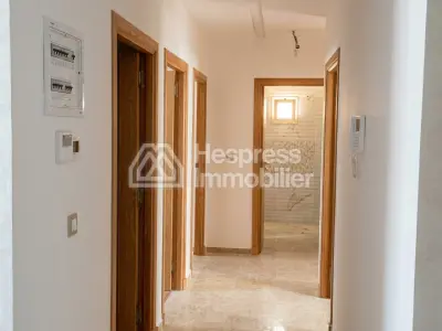 Appartement neuf avec jardin quartier residentiel surface 210 m²