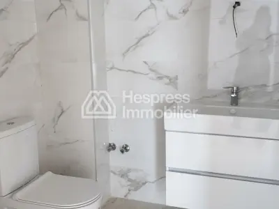 Appartement neuf avec jardin quartier residentiel surface 210 m²