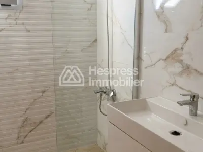 Appartement neuf avec jardin quartier residentiel surface 210 m²