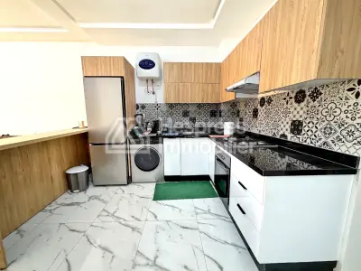 Beachfront apartment in Aourir with swimming pool. Mid-term rental.