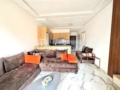 Beachfront apartment in Aourir with swimming pool. Mid-term rental.