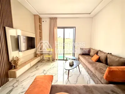 Beachfront apartment in Aourir with swimming pool. Mid-term rental.