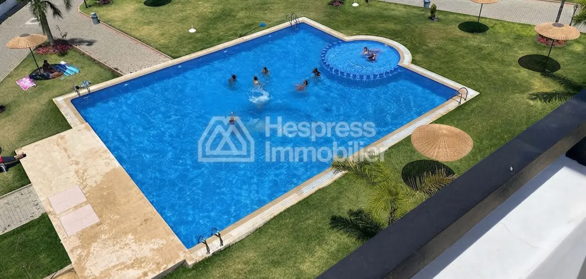 Beautiful furnished apartment for sale in a gated residential complex with communal pool in El Ghandouri Malabata