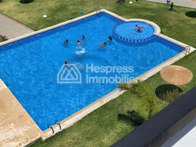 Beautiful furnished apartment for sale in a gated residential complex with communal pool in El Ghandouri Malabata
