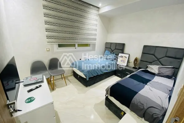 Beautiful furnished apartment for sale in a gated residential complex with communal pool in El Ghandouri Malabata