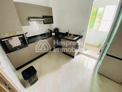 Beautiful furnished apartment for sale in a gated residential complex with communal pool in El Ghandouri Malabata