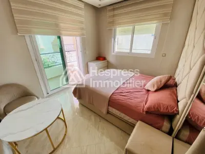 Beautiful furnished apartment for sale in a gated residential complex with communal pool in El Ghandouri Malabata