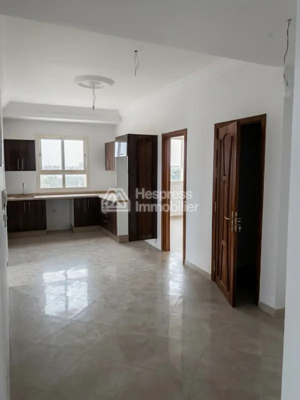 Luxury 3-bedroom apartment with living room in a building. Ain