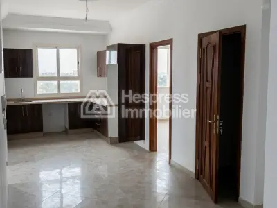 Luxury 3-bedroom apartment with living room in a building. Ain