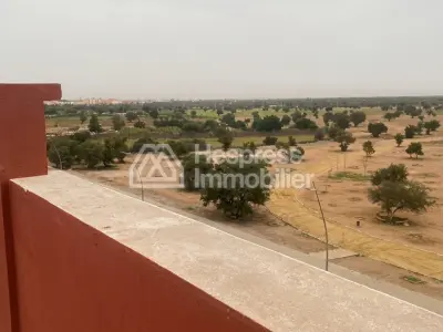 Luxury 3-bedroom apartment with living room in a building. Ain