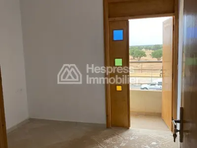 Luxury 3-bedroom apartment with living room in a building. Ain