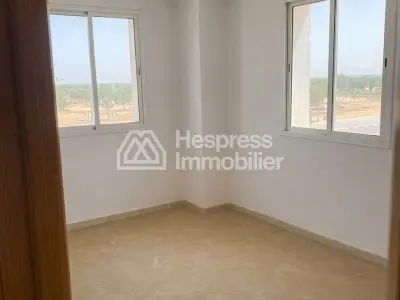 Luxury 3-bedroom apartment with living room in a building. Ain