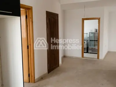 Luxury 3-bedroom apartment with living room in a building. Ain