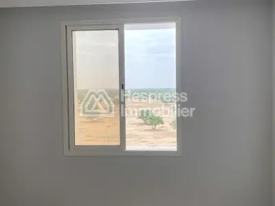 Luxury 3-bedroom apartment with living room in a building. Ain